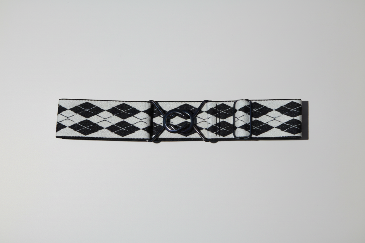 Black and white checkered belt with a buckle on a white background