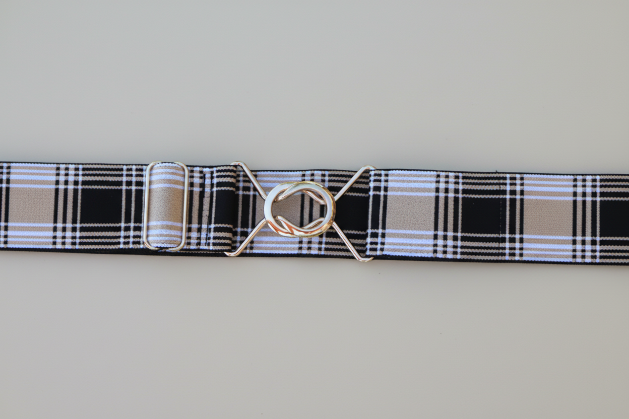 Plaid belt with a gold buckle on a white background