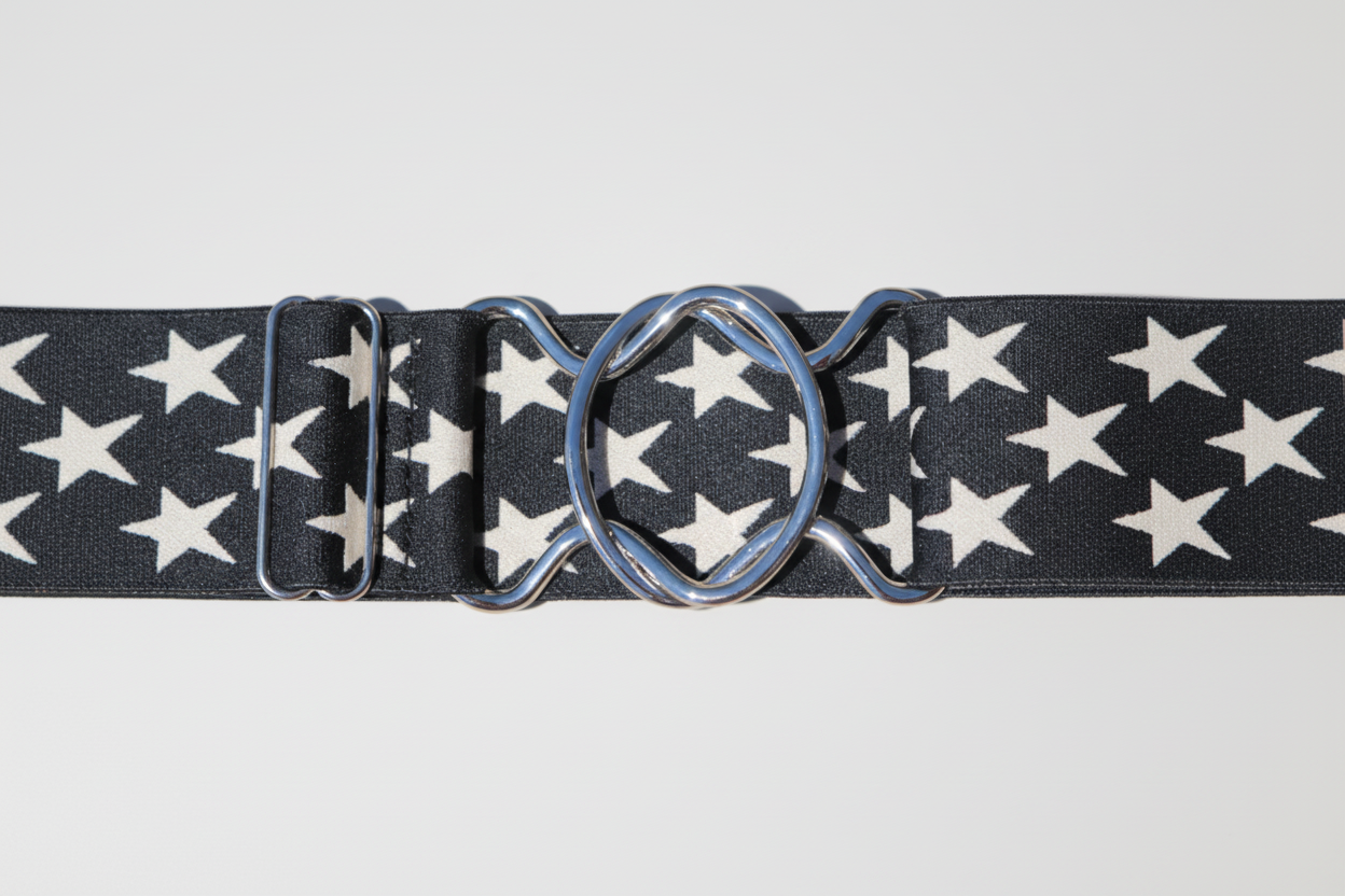 Belt with star pattern and metal buckle on a white background
