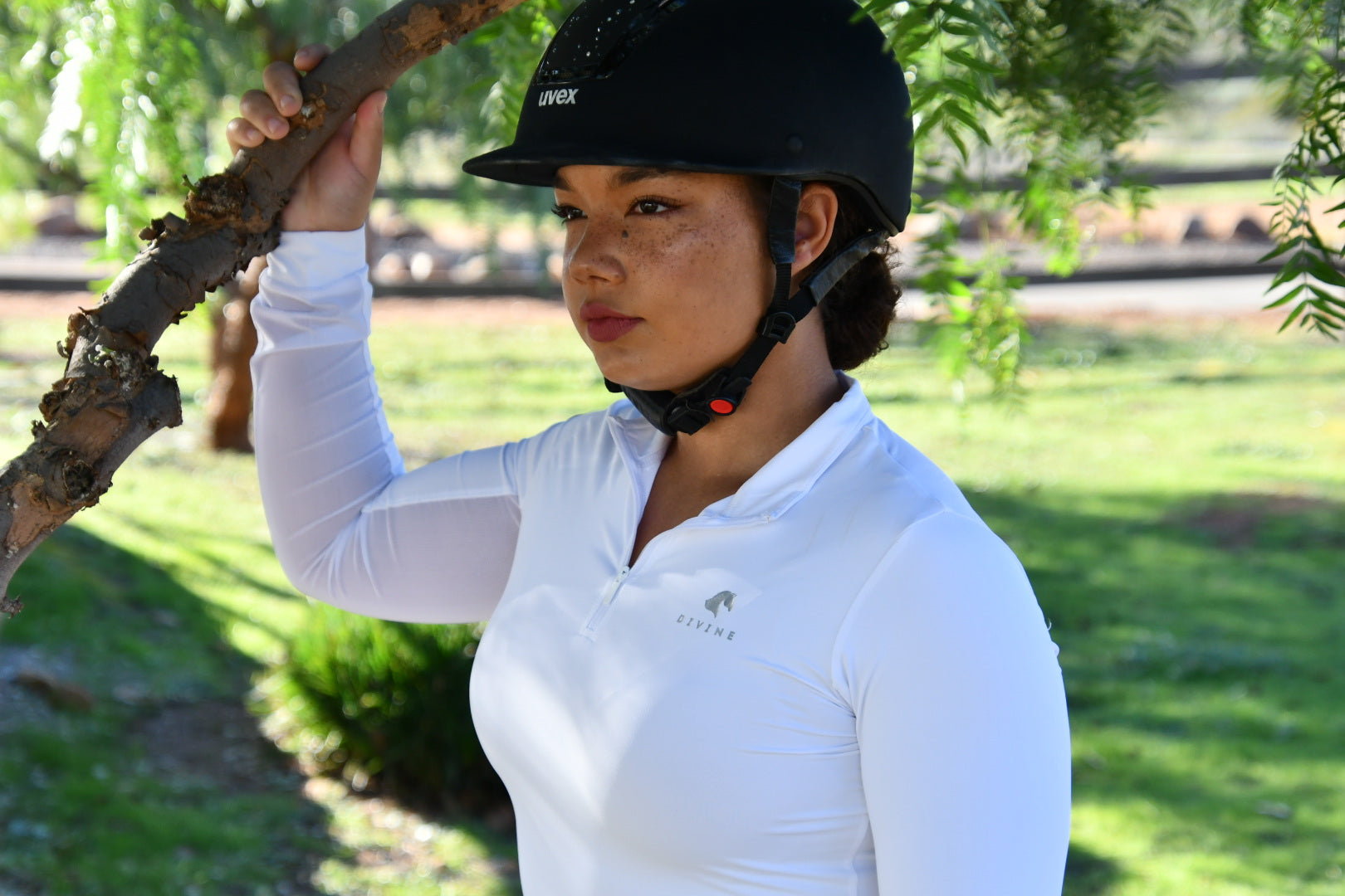 Emme Chisholm wearing Divine Equestrian White Sweet Lady Sun Shirt