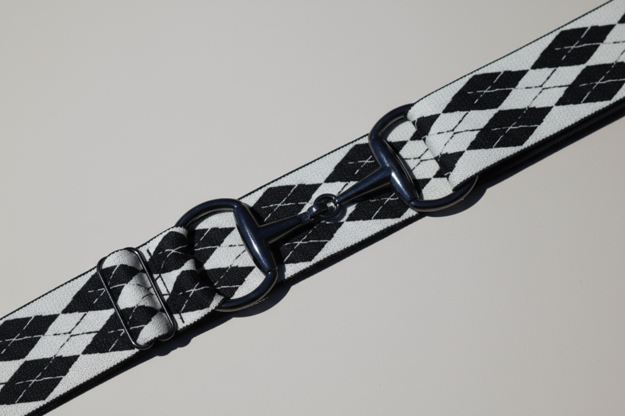 Black and white checkered belt with metal buckle on a white background