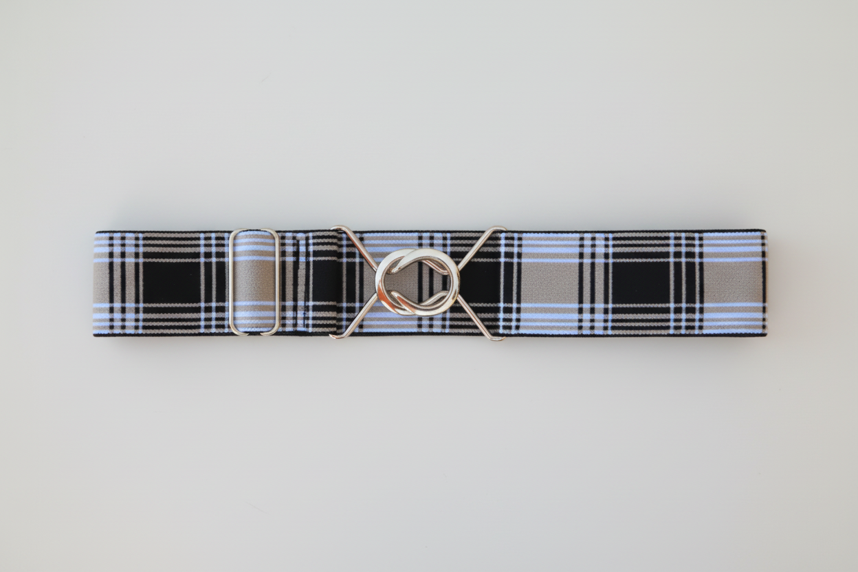Plaid belt with a gold buckle on a white background